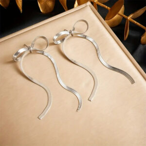 Silver Bow Tassel Earrings