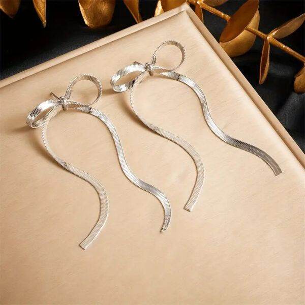 Silver Bow Tassel Earrings